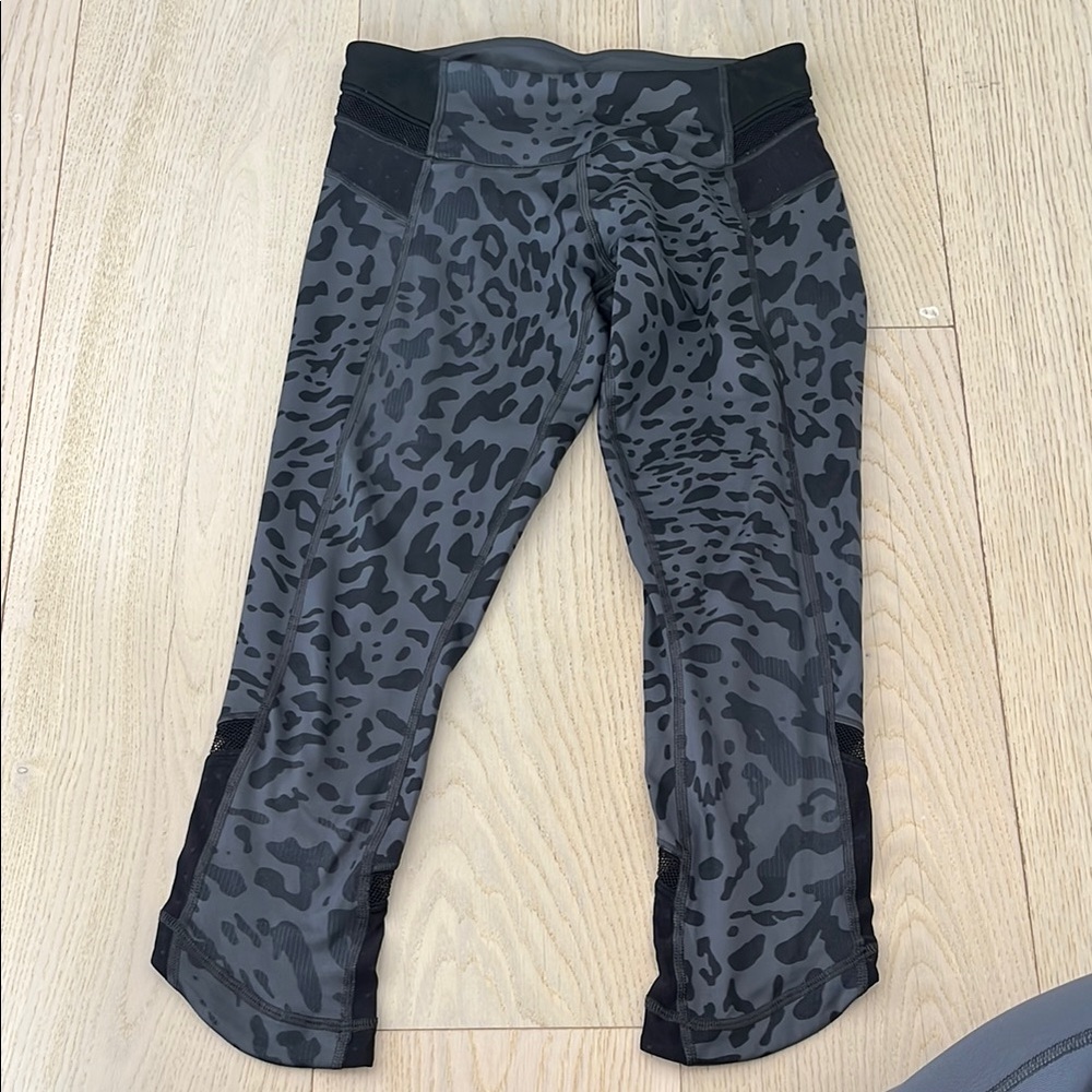 Lululemon Athletica Black Capris with Modern Leopard Print